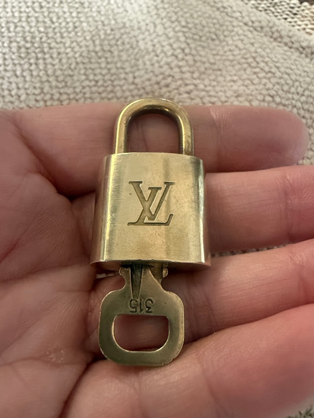 #315 Louis Vuitton Gold Padlock with LV Engraving